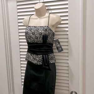 Semi-Formal/cocktail attire. Top only